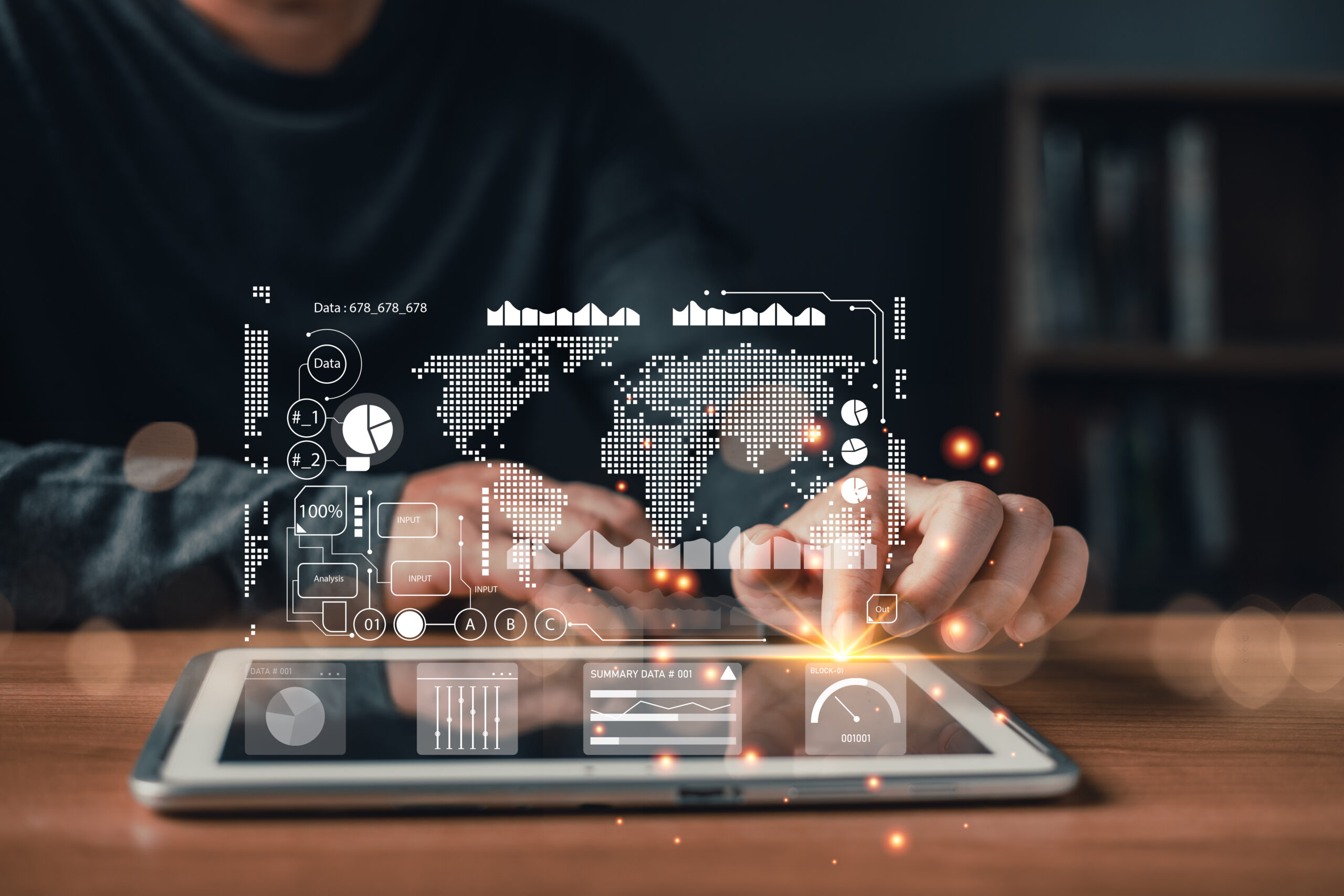A person interacts with a digital tablet displaying futuristic data visualization overlays including charts,maps,and analytics icons representing global technology,statistics, and big data insights.
